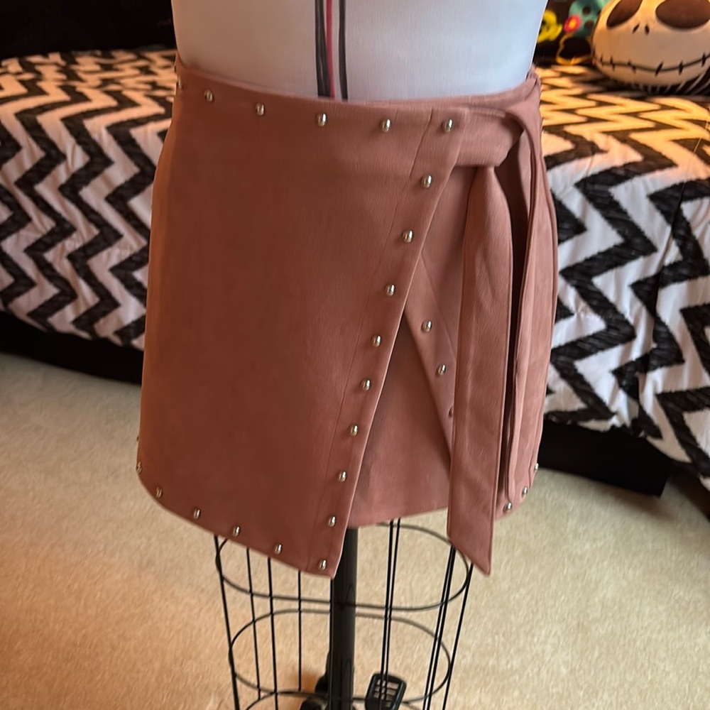 Woman’s pink faux suede mini skirt size medium